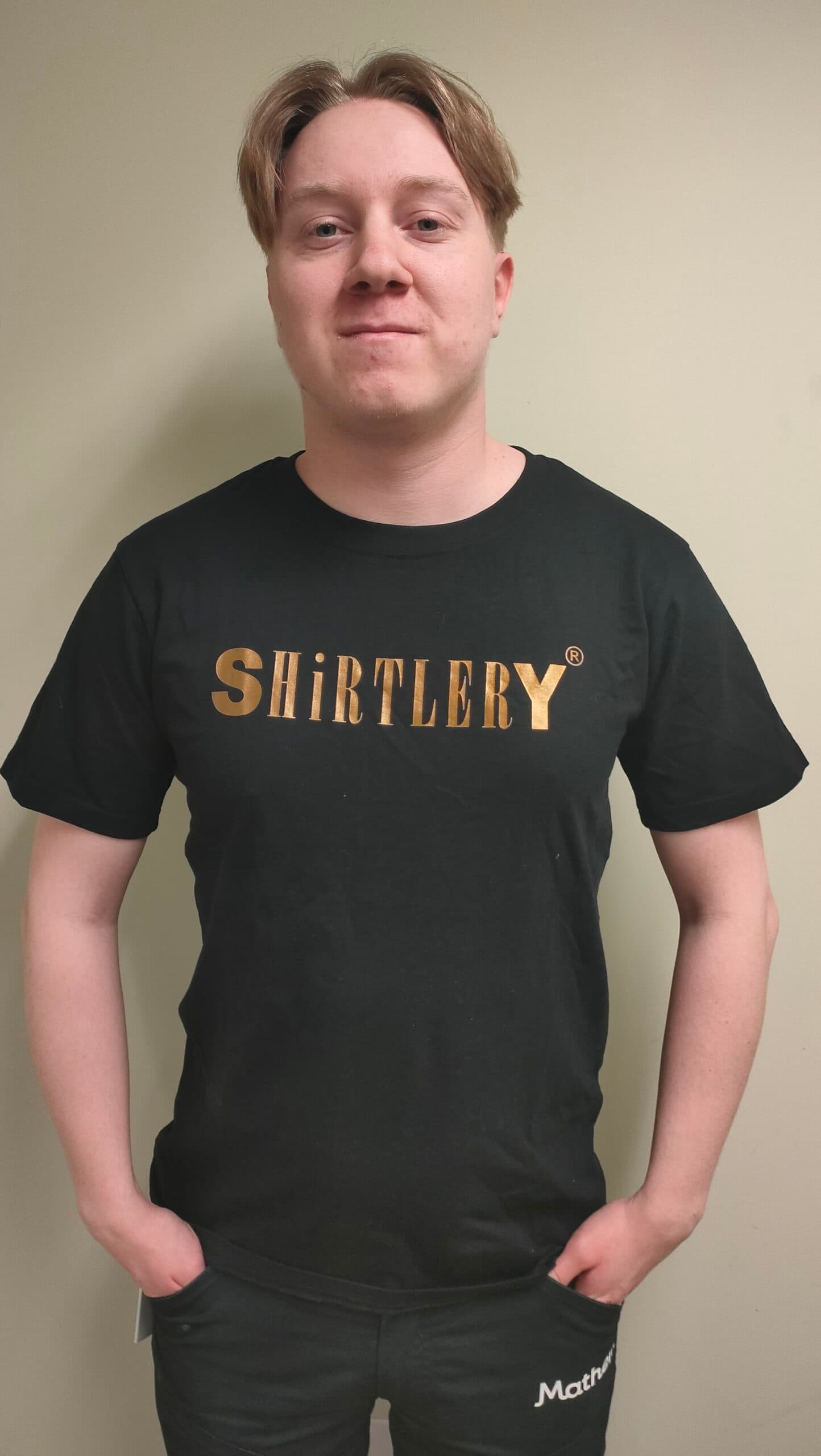 black t-shirt with golden text