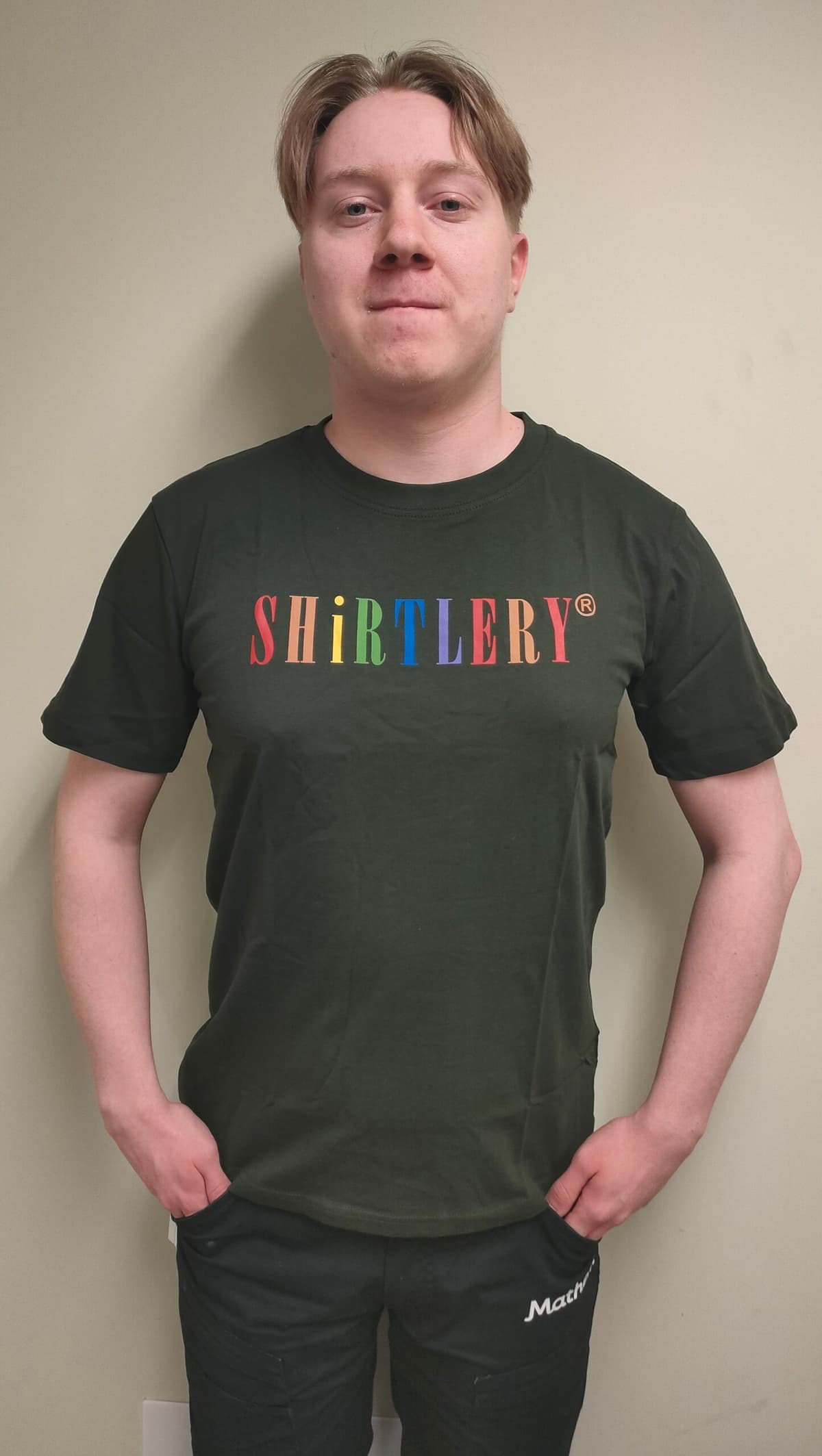 black t-shirt with rainbow text